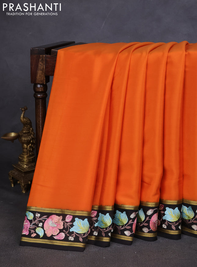 Pure mysore silk saree orange and black with plain body and embroided border