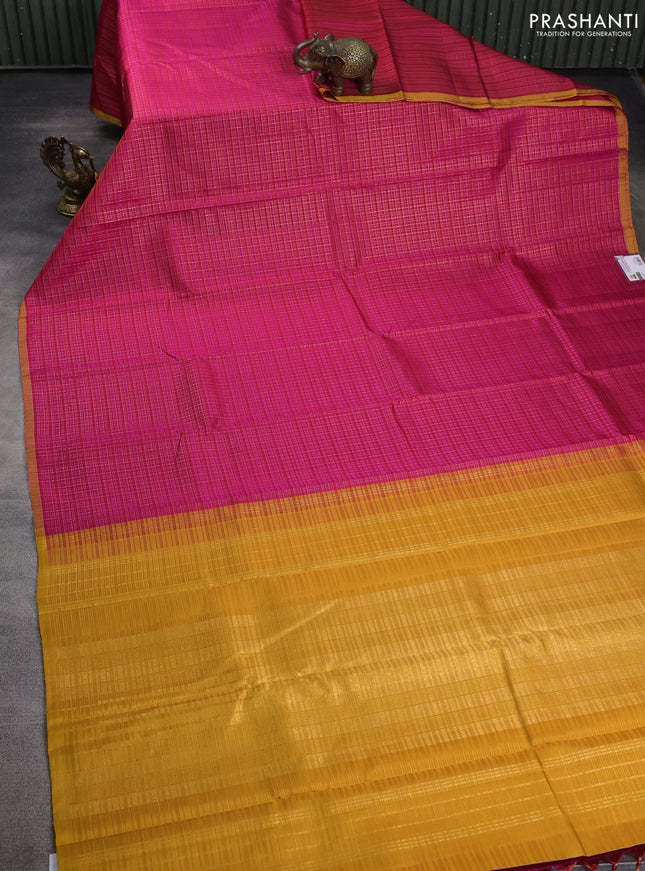 Pure kanchipuram silk saree pink and mustard yellow with allover zari checked pattern and piping border