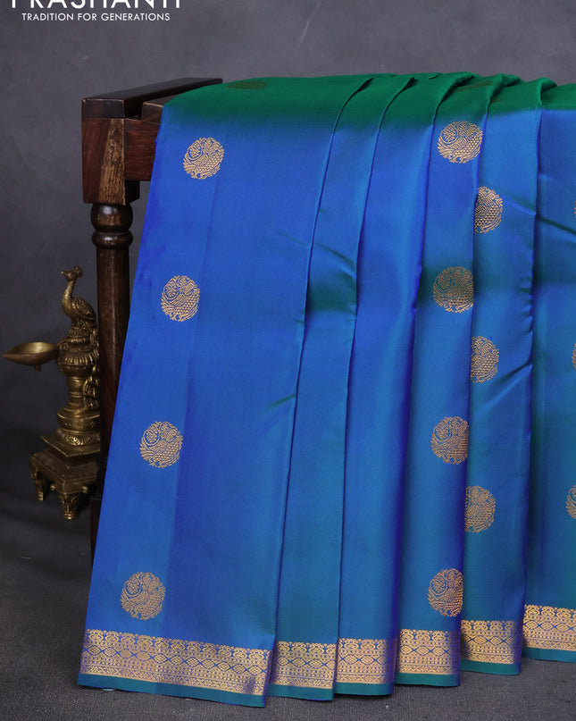 Pure kanchipuram silk saree dual shade of peacock blue with zari woven buttas and zari woven border