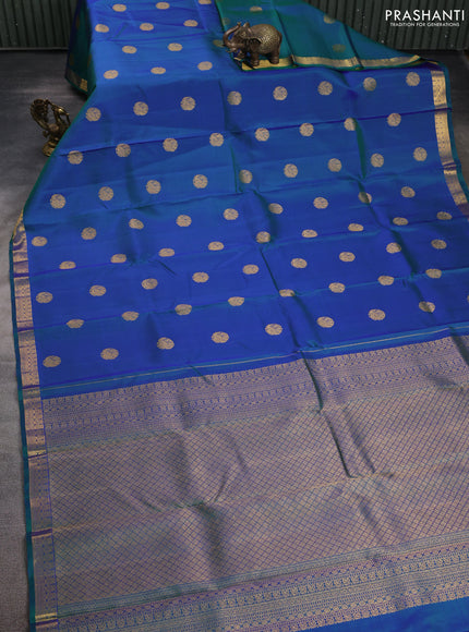 Pure kanchipuram silk saree dual shade of peacock blue with zari woven buttas and zari woven border