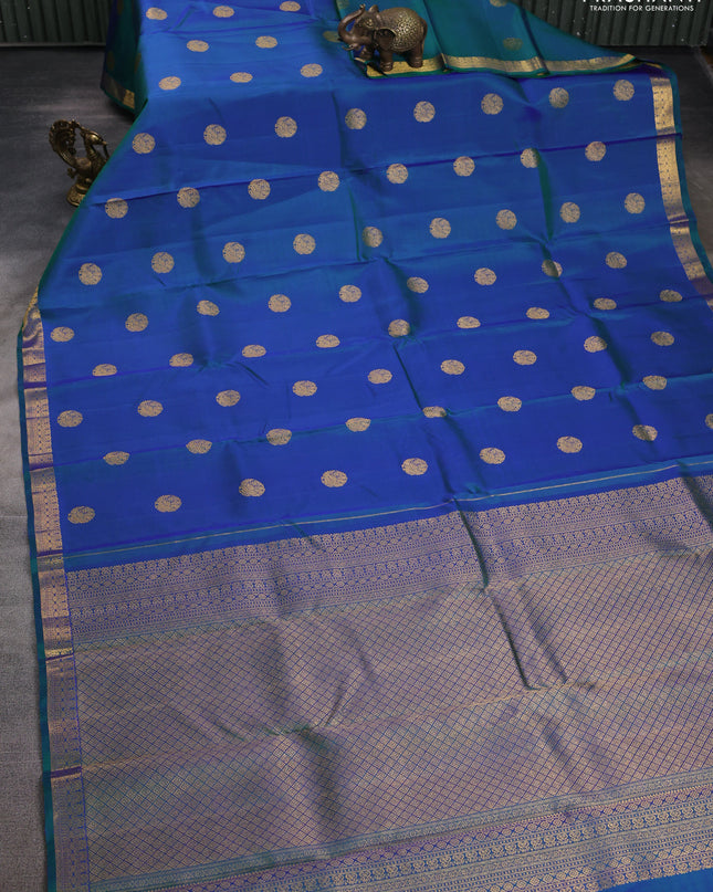 Pure kanchipuram silk saree dual shade of peacock blue with zari woven buttas and zari woven border