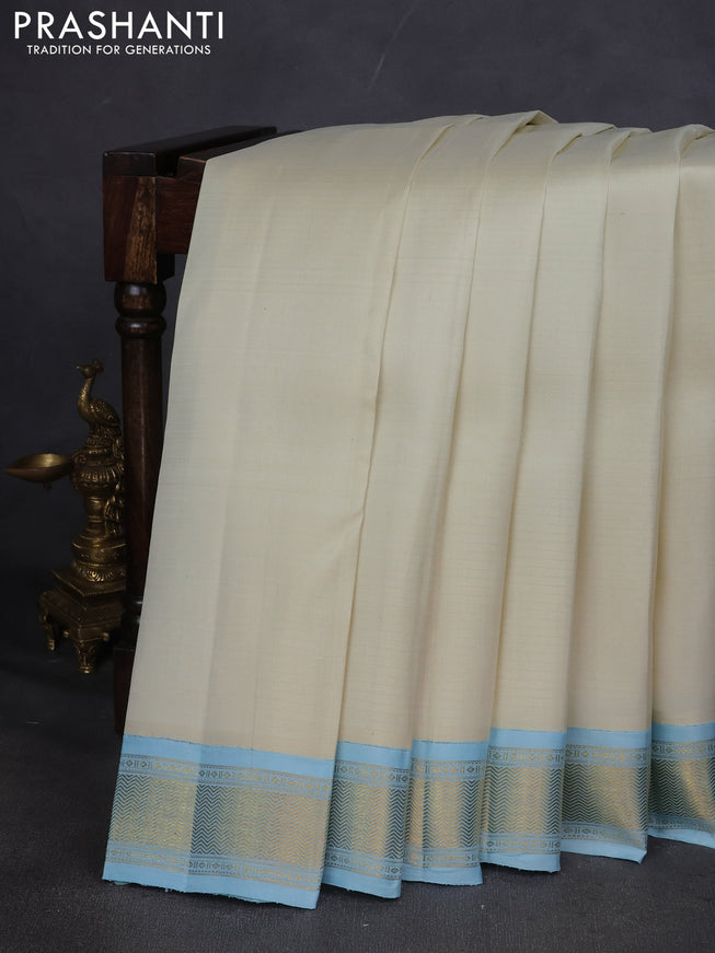 Pure kanchipuram silk saree off white and pastel blue with allover stripes pattern and zari woven korvai border