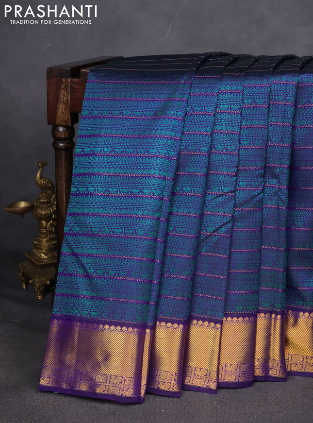 Pure kanchipuram silk saree blue with allover self emboss and zari woven border