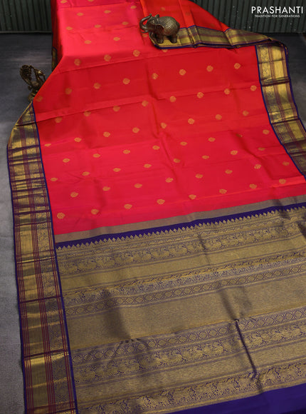 Pure kanchipuram silk saree pinkish orange and blue with zari woven buttas and zari woven korvai border