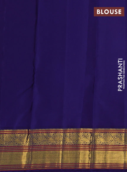 Pure kanchipuram silk saree pinkish orange and blue with zari woven buttas and zari woven korvai border