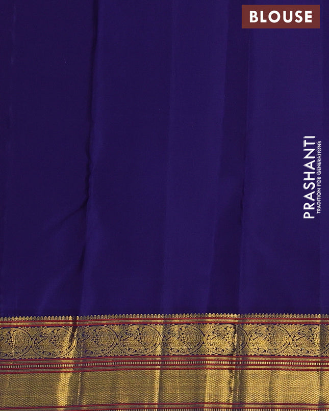 Pure kanchipuram silk saree pinkish orange and blue with zari woven buttas and zari woven korvai border
