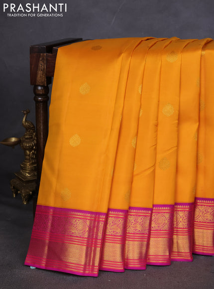 Pure kanchipuram silk saree mustard yellow and purple with zari woven buttas and zari woven korvai border