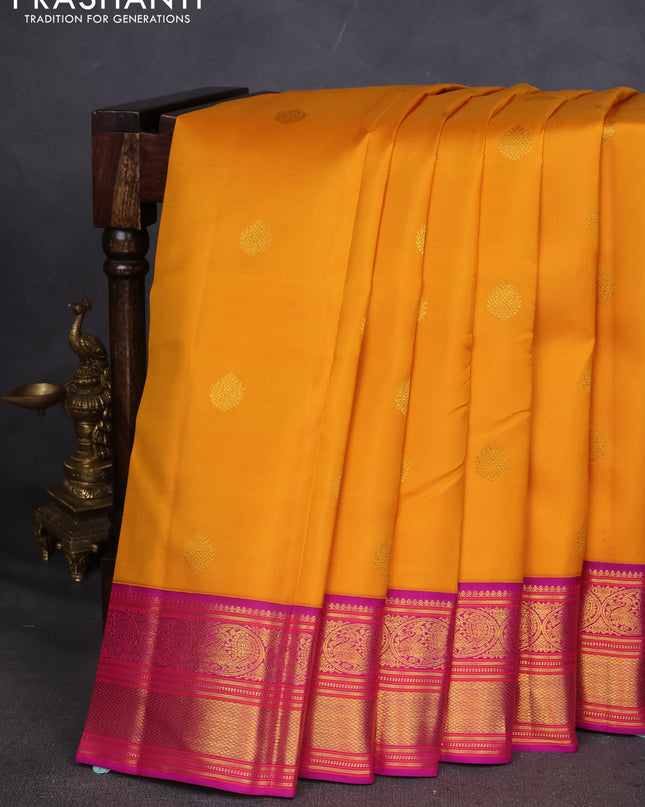 Pure kanchipuram silk saree mustard yellow and purple with zari woven buttas and zari woven korvai border