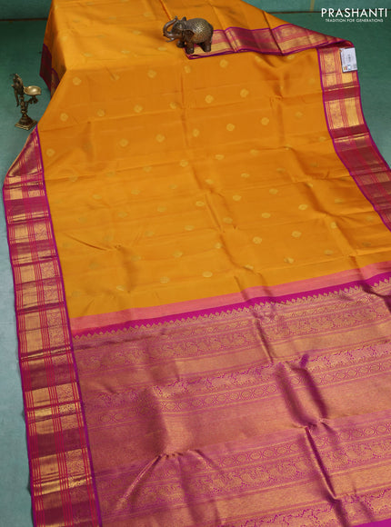 Pure kanchipuram silk saree mustard yellow and purple with zari woven buttas and zari woven korvai border