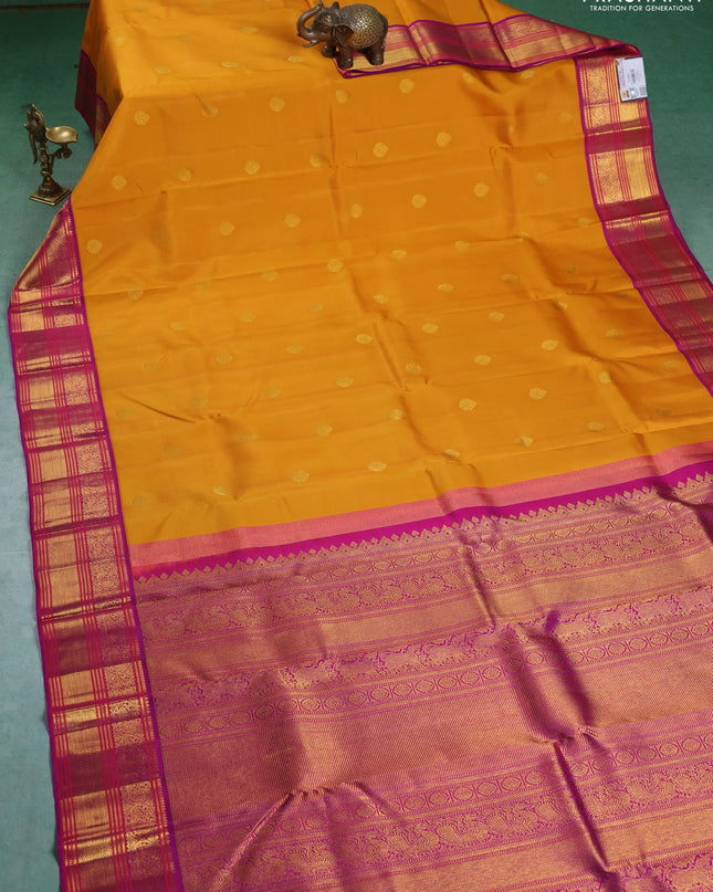 Pure kanchipuram silk saree mustard yellow and purple with zari woven buttas and zari woven korvai border