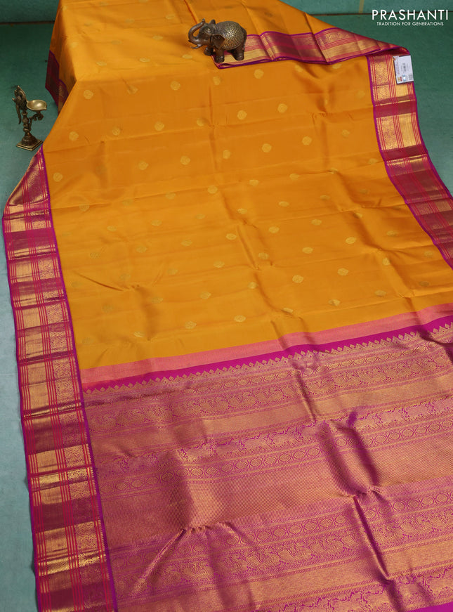 Pure kanchipuram silk saree mustard yellow and purple with zari woven buttas and zari woven korvai border