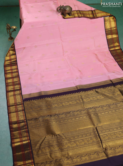 Pure kanchipuram silk saree light pink and deep wine with zari woven buttas and zari woven korvai border