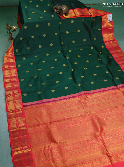 Pure kanchipuram silk saree green and orange with zari woven buttas and zari woven korvai border