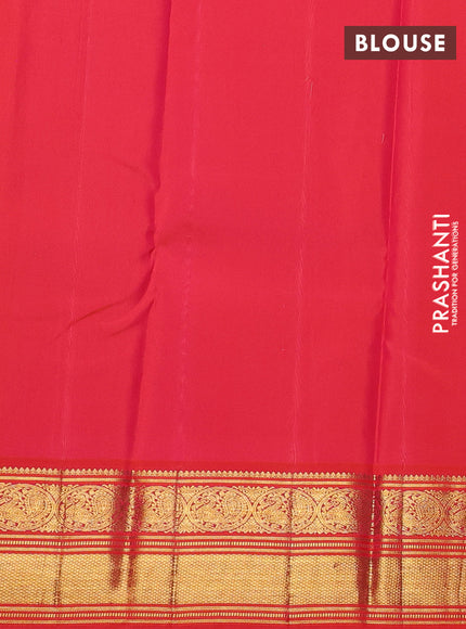 Pure kanchipuram silk saree green and orange with zari woven buttas and zari woven korvai border