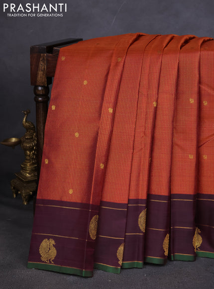 Pure kanchipuram silk saree rustic orange and deep wine with allover small zari checked pattern and annam zari woven butta border