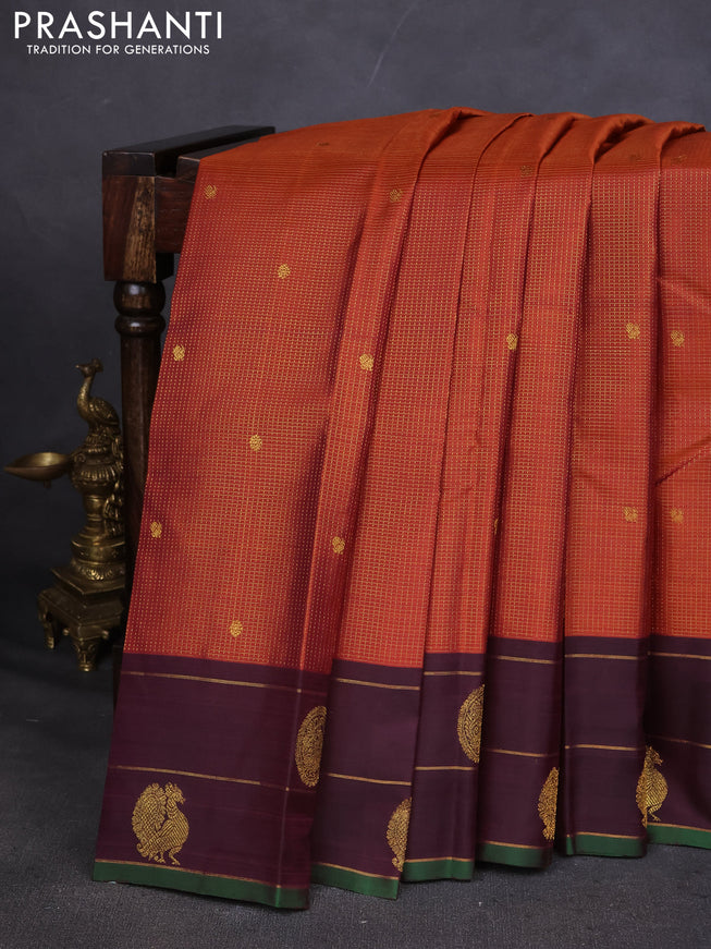 Pure kanchipuram silk saree rustic orange and deep wine with allover small zari checked pattern and annam zari woven butta border