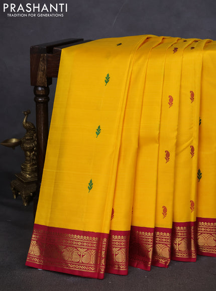 Pure kanchipuram silk saree mango yellow and maroon with thread woven buttas and zari woven border
