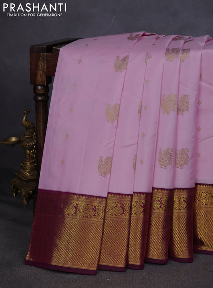 Pure kanchipuram silk saree light pink and purple with annam zari woven buttas and zari woven korvai border