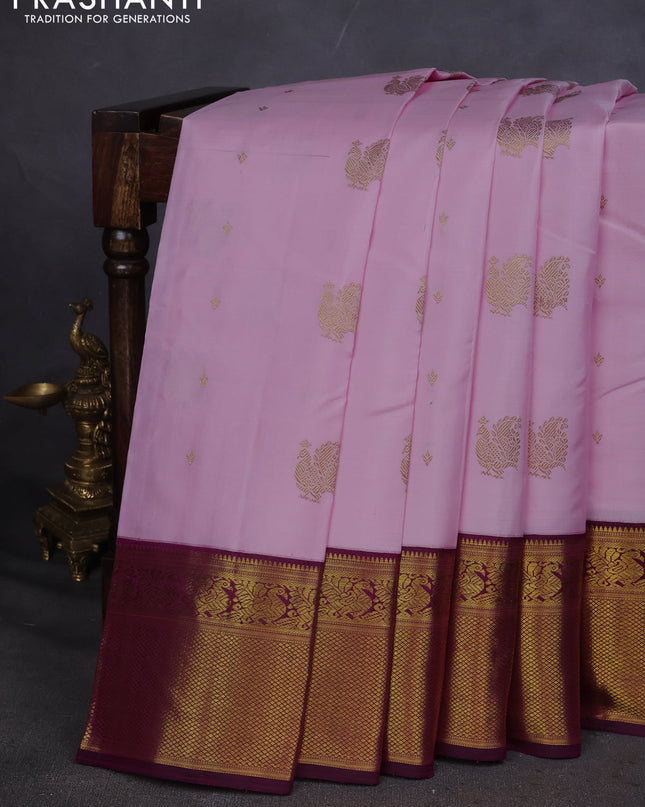 Pure kanchipuram silk saree light pink and purple with annam zari woven buttas and zari woven korvai border