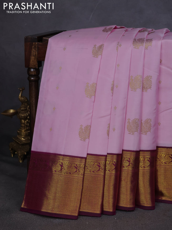 Pure kanchipuram silk saree light pink and purple with annam zari woven buttas and zari woven korvai border
