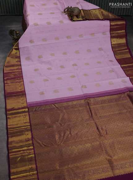 Pure kanchipuram silk saree light pink and purple with annam zari woven buttas and zari woven korvai border