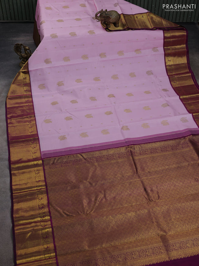Pure kanchipuram silk saree light pink and purple with annam zari woven buttas and zari woven korvai border