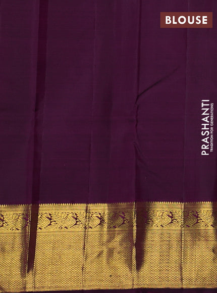 Pure kanchipuram silk saree light pink and purple with annam zari woven buttas and zari woven korvai border