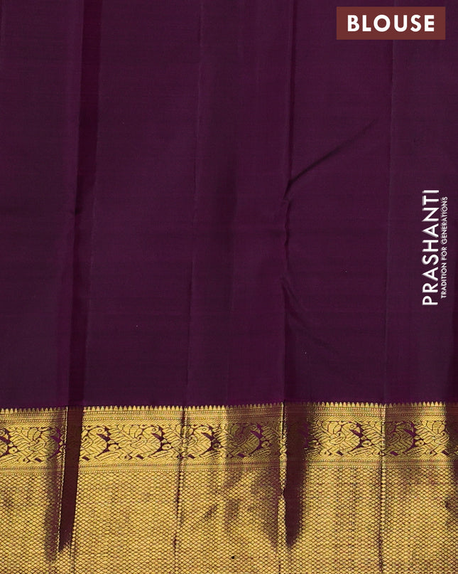 Pure kanchipuram silk saree light pink and purple with annam zari woven buttas and zari woven korvai border