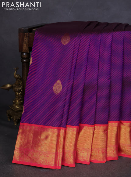 Pure kanchipuram silk saree blue and orange with allover self emboss and zari woven korvai border