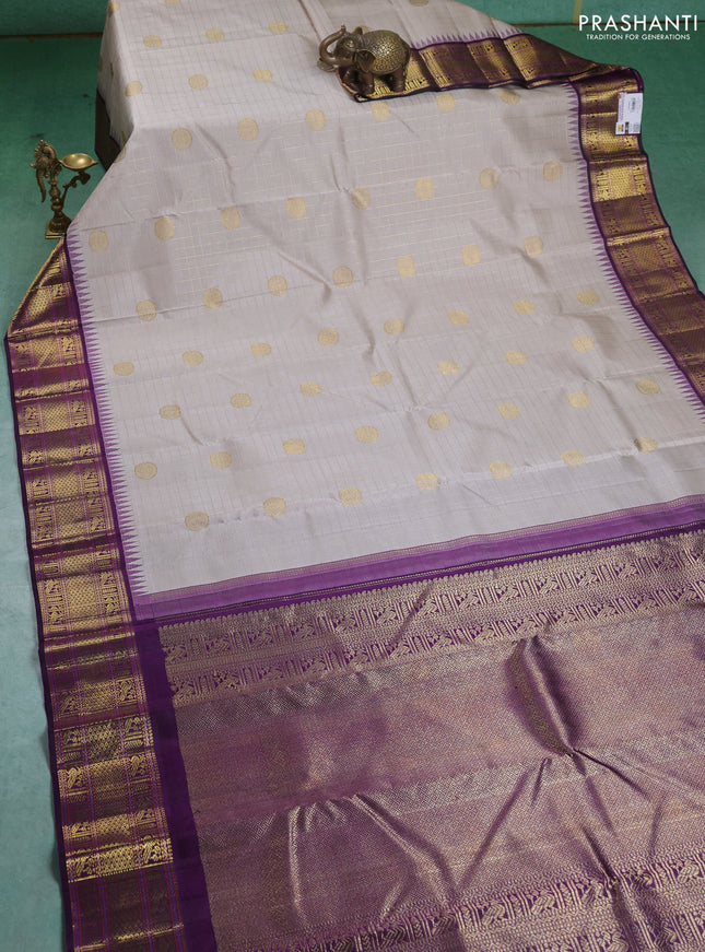 Pure kanchipuram silk saree grey and deep purple with allover zari checks & buttas and zari woven korvai border