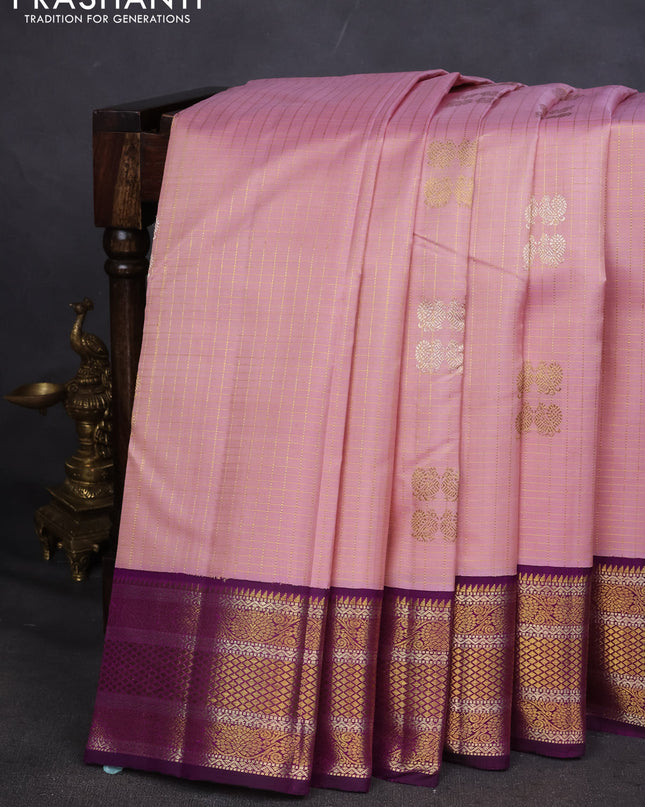 Pure kanchipuram silk saree light pink and purple with allover zari checks & buttas and zari woven korvai border