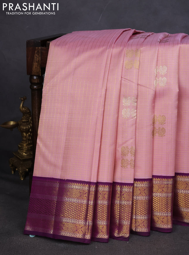 Pure kanchipuram silk saree light pink and purple with allover zari checks & buttas and zari woven korvai border