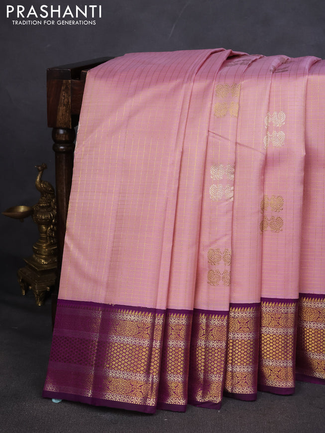Pure kanchipuram silk saree light pink and purple with allover zari checks & buttas and zari woven korvai border