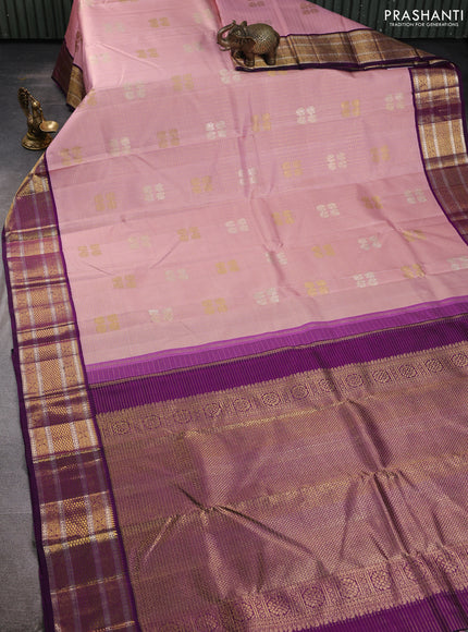 Pure kanchipuram silk saree light pink and purple with allover zari checks & buttas and zari woven korvai border