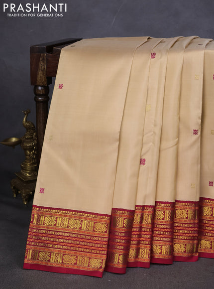 Pure kanchipuram silk saree sandal and maroon with thread woven buttas and zari woven korvai border