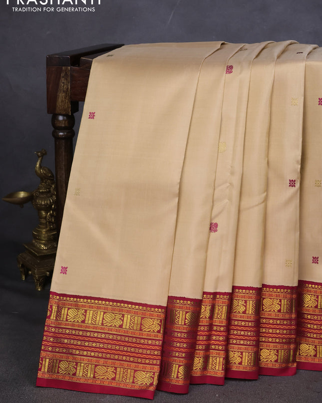 Pure kanchipuram silk saree sandal and maroon with thread woven buttas and zari woven korvai border