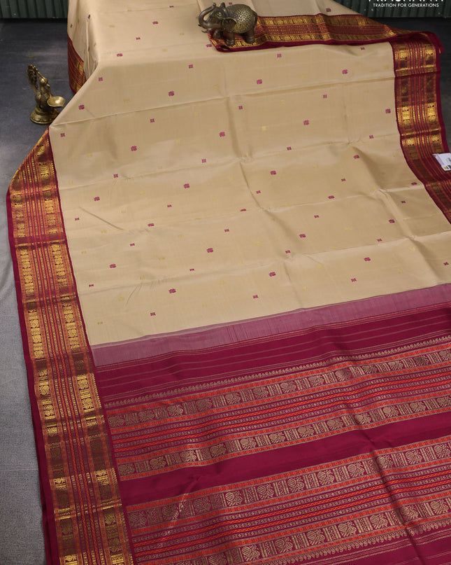 Pure kanchipuram silk saree sandal and maroon with thread woven buttas and zari woven korvai border