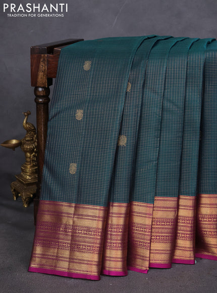 Pure kanchipuram silk saree peacock green and purple with allover zari checks and zari woven border