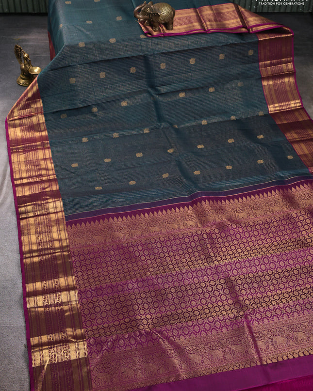 Pure kanchipuram silk saree peacock green and purple with allover zari checks and zari woven border