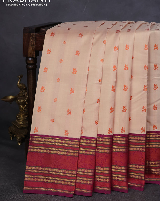 Pure kanchipuram silk saree sandal and purple with thread woven buttas and zari woven border