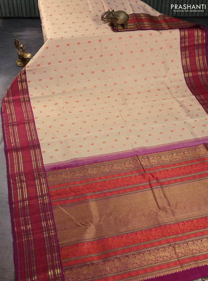 Pure kanchipuram silk saree sandal and purple with thread woven buttas and zari woven border
