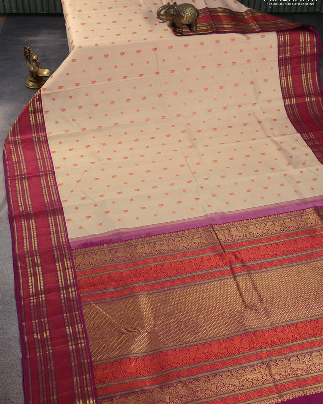Pure kanchipuram silk saree sandal and purple with thread woven buttas and zari woven border