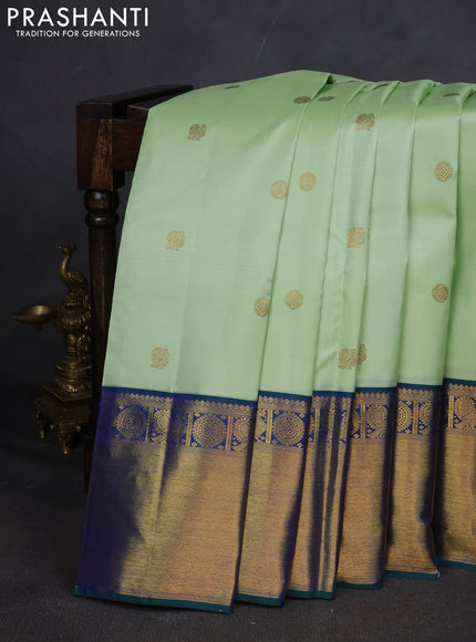 Pure kanchipuram silk saree pista green and dual shade of green with annam zari woven buttas and zari woven border