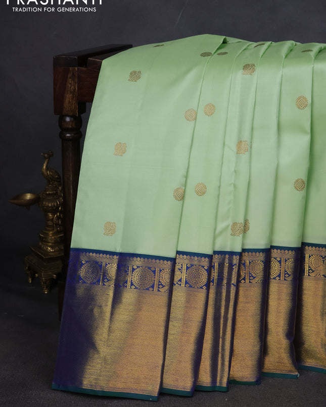 Pure kanchipuram silk saree pista green and dual shade of green with annam zari woven buttas and zari woven border