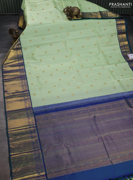 Pure kanchipuram silk saree pista green and dual shade of green with annam zari woven buttas and zari woven border