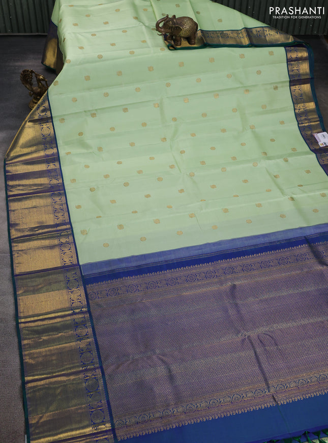 Pure kanchipuram silk saree pista green and dual shade of green with annam zari woven buttas and zari woven border