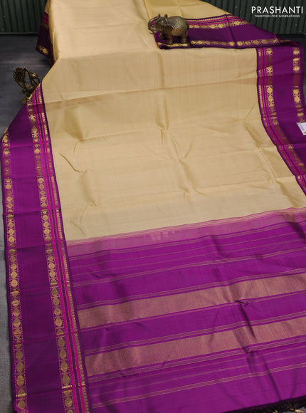 Pure kanchipuram silk saree sandal and purple with plain body and rettapet zari woven border