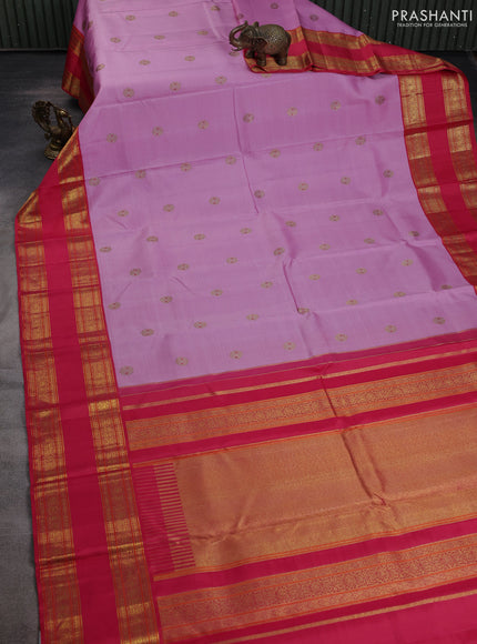 Pure kanchipuram silk saree light pink and pink with zari woven buttas and rettapet zari woven border