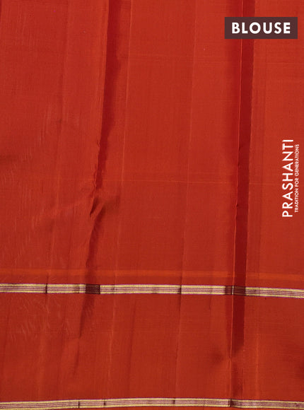 Pure kanchipuram silk saree off white and orange with allover thread woven checked pattern and rettapet zari woven border