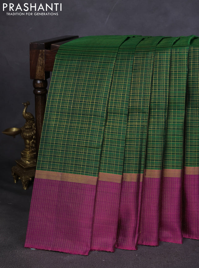 Pure kanchipuram silk saree green and purple with allover zari checked pattern and zari checked border